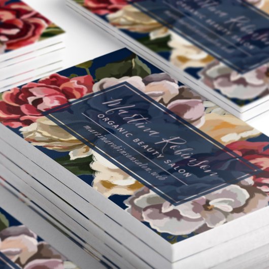 Elegante rode crème bloemen op marineblauw visitekaartje