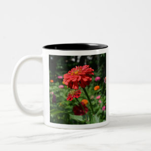 Elegante rode oranje bloementuin tweekleurige koffiemok