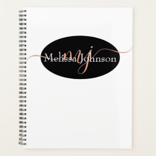 Elegante roze gouden letters op zwart planner
