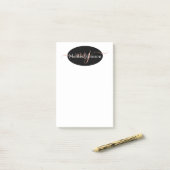 Elegante roze gouden letters op zwart post-it® notes (Op bureau)