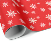 Elegante sneeuwvlokken op rood cadeaupapier (Rol Hoek)