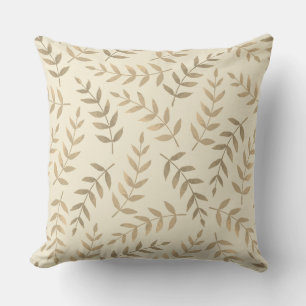 Elegante tropische bladeren op champagne beige kussen