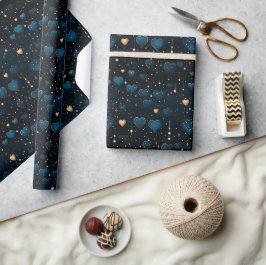 Elegante vallende kosmische harten in blauw en gou cadeaupapier