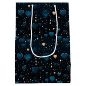 Elegante vallende kosmische harten in blauw en gou medium cadeauzakje (Achterkant)