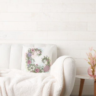 Elegante vintage bloemenkrans met roze rozen en kussen
