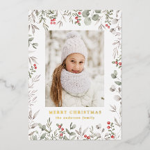 Elegante winterblad en hulstbessen foto