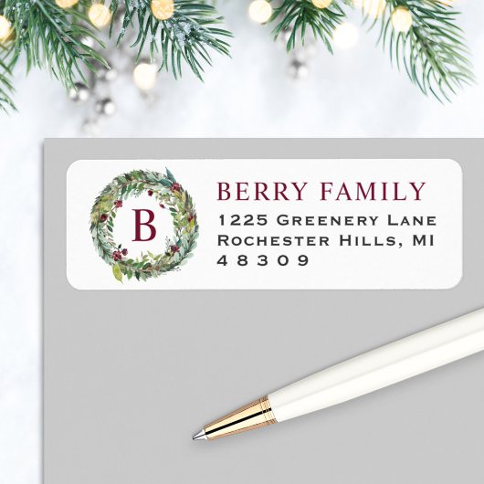 Elegante wintergroene belettering in bordeauxrood etiket