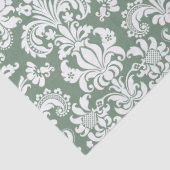 Elegante witte bloemdamast over salie groen tissuepapier (Detail)