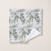 Elegante witte bloemen en groene handdoek (Wasdoekje)
