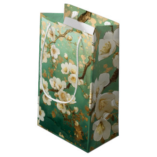 Elegante witte bloesem geschenktas met gouden acce klein cadeauzakje
