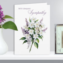 Elegante witte en lila bloemen diepste medeleven