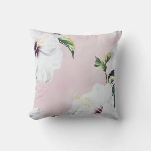 Elegante witte hibiscus op zachte roze achtergrond kussen