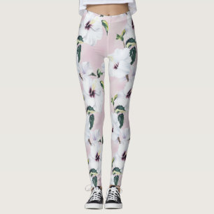Elegante witte hibiscus op zachte roze achtergrond leggings