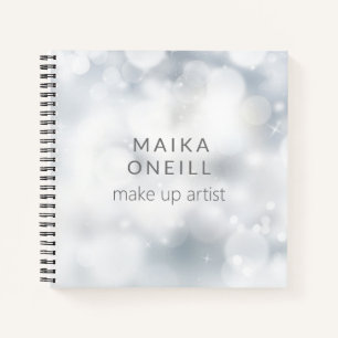 Elegante zilveren gepersonaliseerde bokeh van de notitieboek