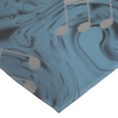 elegante zilvermuzieknoten in blauw tafelkleed (Gekanteld)