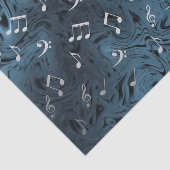 elegante zilvermuzieknoten in blauw tissuepapier (Detail)