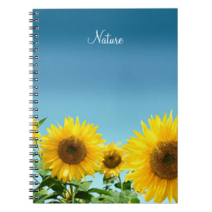 Elegante Zonnebloemen op Hemelblauwe Tinten Notitieboek