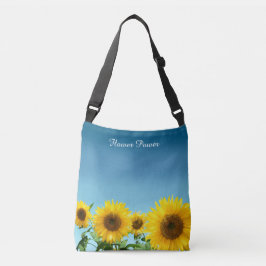 Elegante zonnebloemen op luchtblauwe tinten crossbody tas