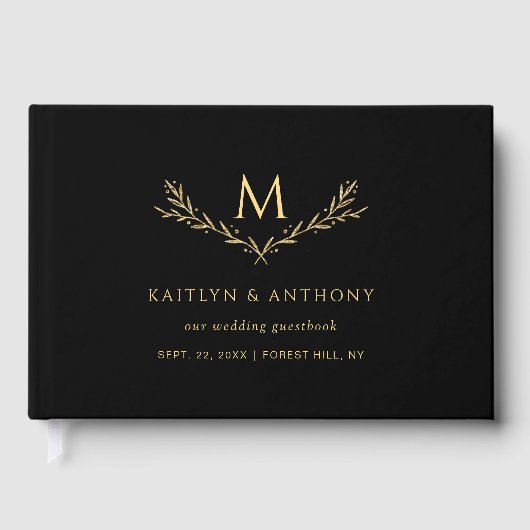 Elegante zwart en goud monogram krans bruiloft gastenboek (Voorkant)