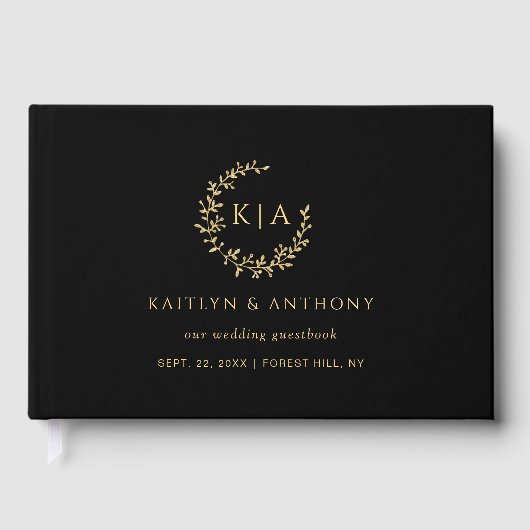 Elegante zwart en goud monogram krans bruiloft gastenboek (Voorkant)