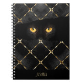Elegante zwarte kat ogen in het donker notitieboek (Voorkant)
