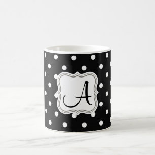 Elegante zwarte stippen aanvankelijke naam met koffiemok