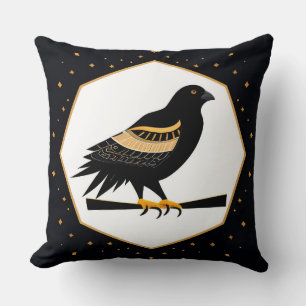 Elegante zwarte vogel met gouden details kussen