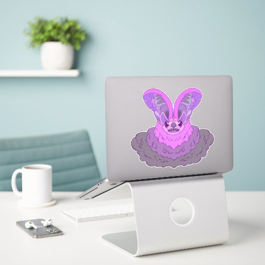 Elegantie in duisternis sticker (Laptop op bureau)
