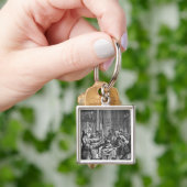Elektrisch experiment uitgevoerd op een man sleutelhanger (Hand)
