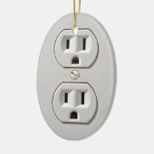 Elektrisch stopcontact inpluggen keramisch ornament (Links)