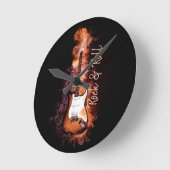 Elektrische gitaarrots en rolvleugels ronde klok (Hoek)