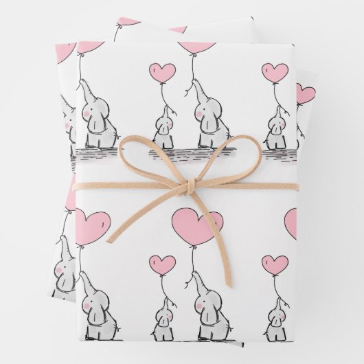 Elephant-familie met roze hartballonnen inpakpapier vel (In situ)
