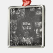 Elf groteske gezichten metalen ornament (Links)