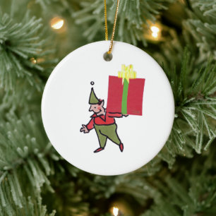 Elf met rode doos ronde keramische kerstboomorname keramisch ornament