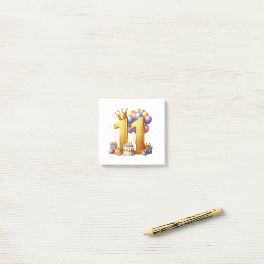 Elfde verjaardag goud post-it® notes (Op bureau)