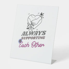 Elkaar steunen reclamebord met voetstuk