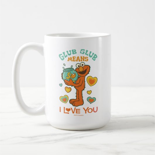 Elmo met zijn huisgoudvis koffiemok (Links)