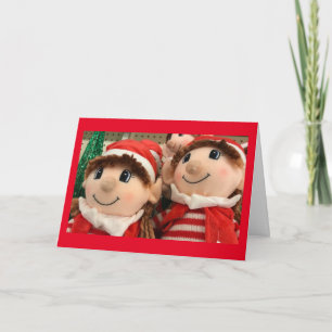 "ELVES" ZIJN GEDAAN MET TOYS EN ZEGGEN MERRY CHRIS KAART