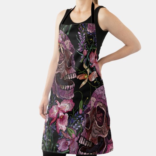 Embroiderige menselijke schedel en roze orchidee b schort (Insitu)