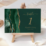Emerald Green Gold Agate Wedding Kaart<br><div class="desc">De linkerkant van deze elegante moderne trouwtafel nummerkaart heeft een smaragdgroene waterverf agaatrand afgewerkt met faux gouden glitter. De aanpasbare tekst combineert goudkleurig handschrift,  cursief en koperplaat lettertypen op een groene achtergrond.</div>