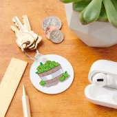 Emmer van groene appels sleutelhanger