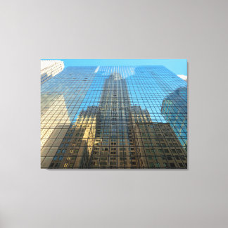 Empire State Building-weerkaatsing op glazen gebou Canvas Afdruk