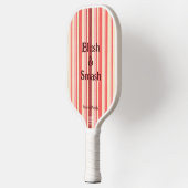  en roze pickleball paddle (Links)