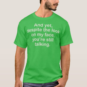 EN TOCH, ONDANKS DE BLIK OP MIJN GEZICHT, BEN JE N T-SHIRT
