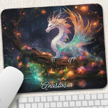 Enchanted Forest Dragon gepersonaliseerd Muismat<br><div class="desc">Transformeer uw werkruimte in een magisch rijk met deze betoverende muismat met een majestueuze draak genesteld in een etherisch bos. De levendige kleuren en ingewikkelde details brengen de scène tot leven, inspirerende creativiteit en verwondering. Het gladde oppervlak zorgt voor nauwkeurige muisbewegingen terwijl de antislip-achterkant het stevig op zijn plaats houdt....</div>