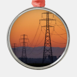 Energiemasten bij zonsondergang metalen ornament