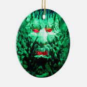 Eng masker gezicht in rotswand keramisch ornament (Rechts)