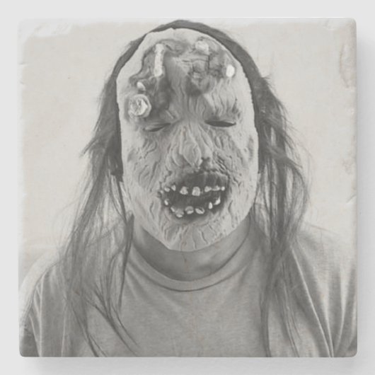 Eng masker stenen onderzetter (Voorkant)