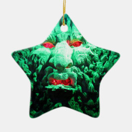 Eng maskerend gezicht in rotswand keramisch ornament