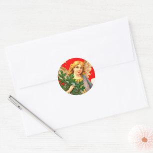 Engel in lavendel die kerstboom draagt ronde sticker